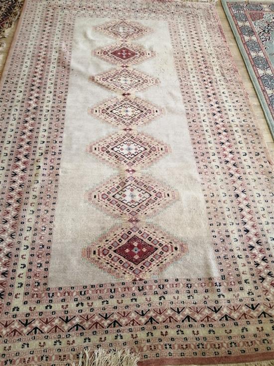A Persian rug, 265 x 158cm